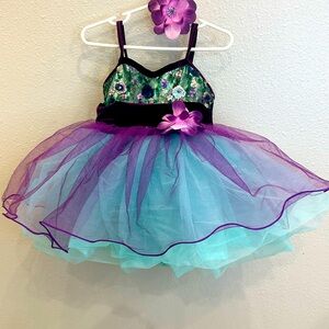 Dance performing tutu. Color:Purple/mint Sz: CSM. Inc. flower clip for hair.